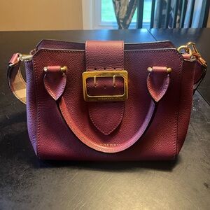 Beautiful rare, Burberry purse in maroon and excellent brand new condition